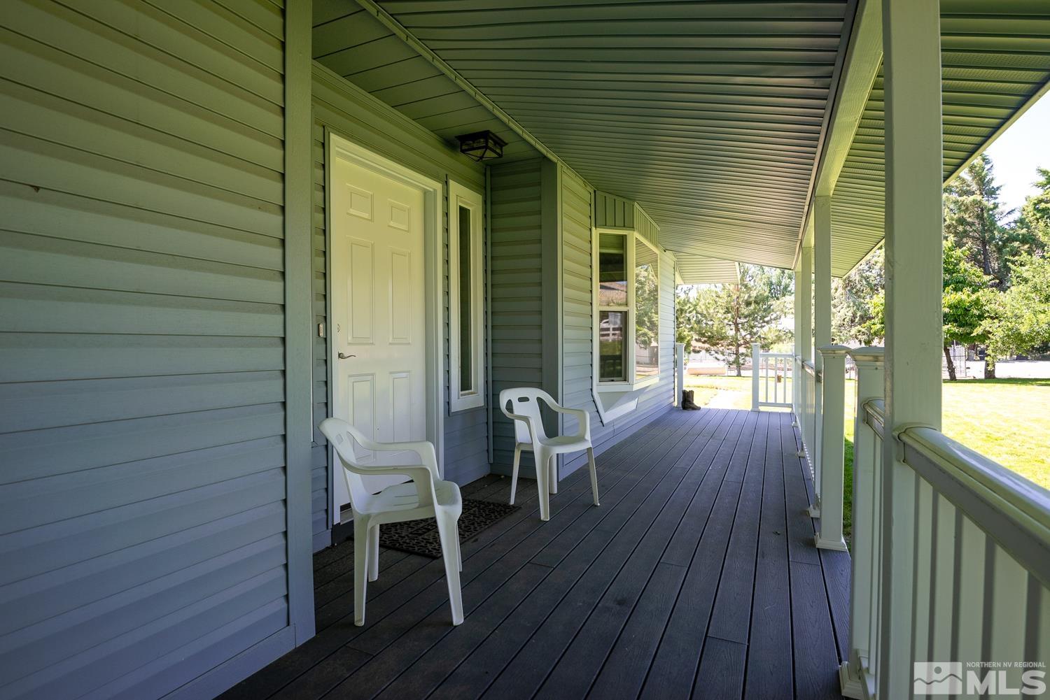 270 Kitts Way Reno, NV 89521 - Photo 9 of 16 a porch with wooden floor