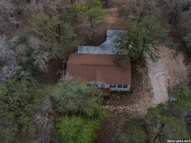 135 Savannah Ridge Von Ormy, TX 78073 - Photo 37 of 45 a backyard of a house with lots of green space