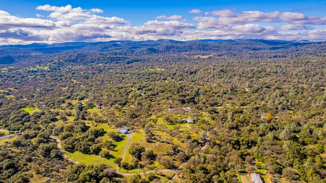 a view of a city with mountain