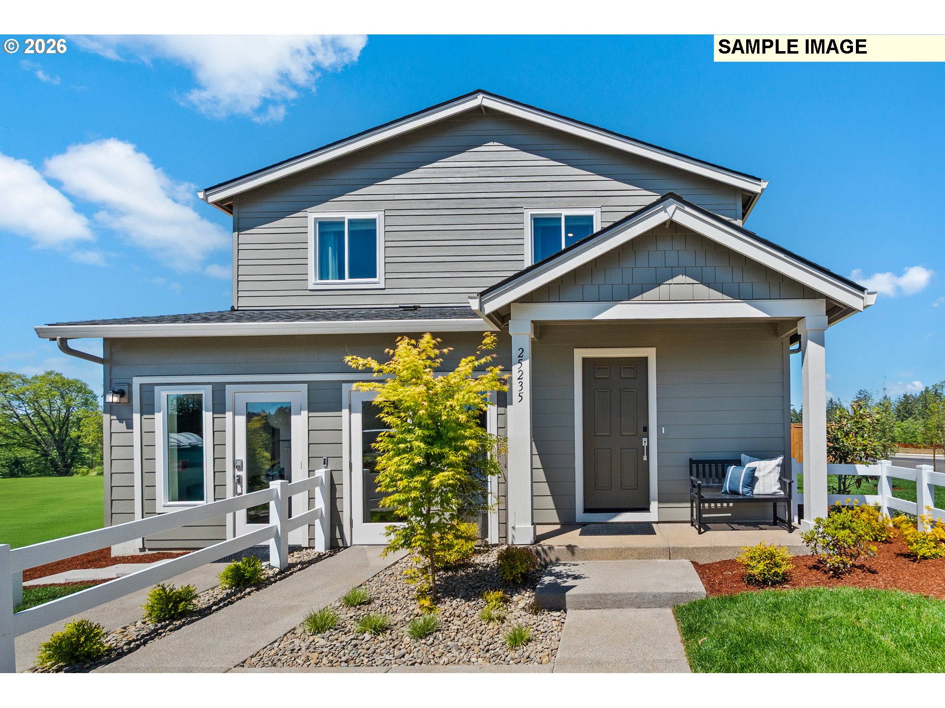 5754 Bainbridge Road Eugene, OR 97402 - Photo 5 of 29 a front view of a house with garden