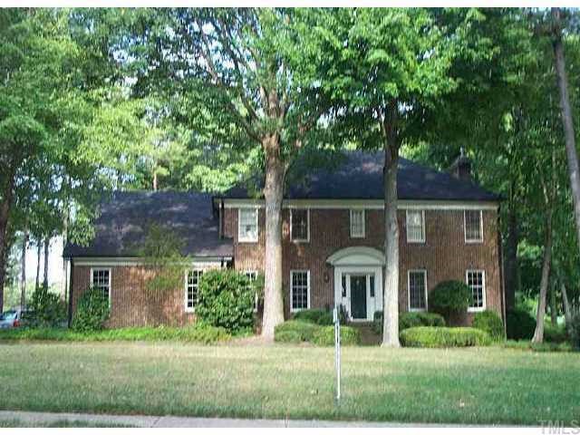 7037 North Ridge Drive Raleigh, NC 27615 - Photo 1 of 1 front view of a house with a yard