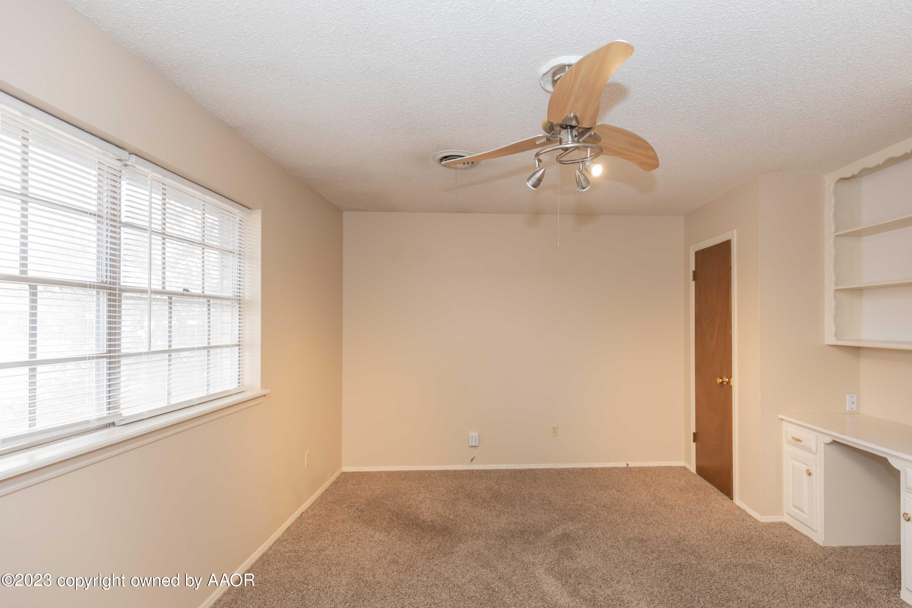 3410 Harmony Street Amarillo, TX 79109 - Photo 34 of 41 a view of an empty room with a window
