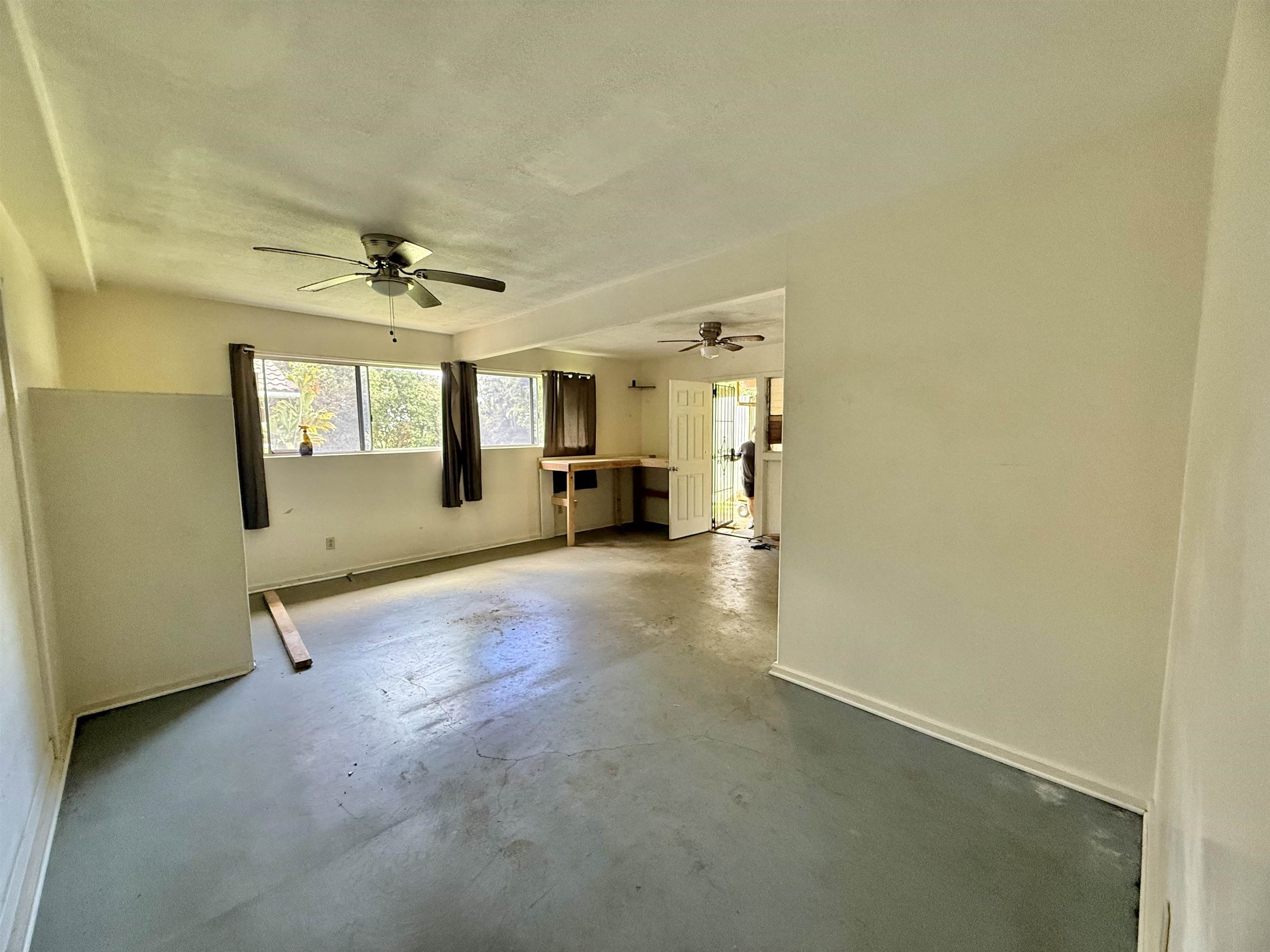 1630 Kauhikoa Road Haiku, HI 96708 - Photo 42 of 48 a view of a livingroom with a staircase