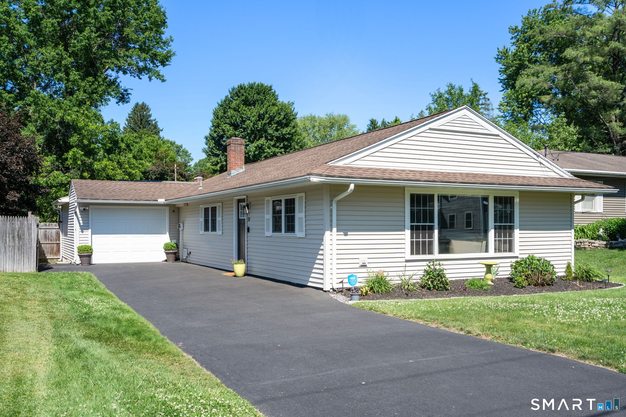 31 Cowan Street Suffield, CT 06078 - Photo 1 of 29 front view of a house and a yard