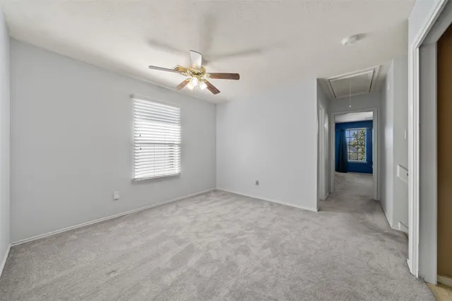 a view of empty room with windows