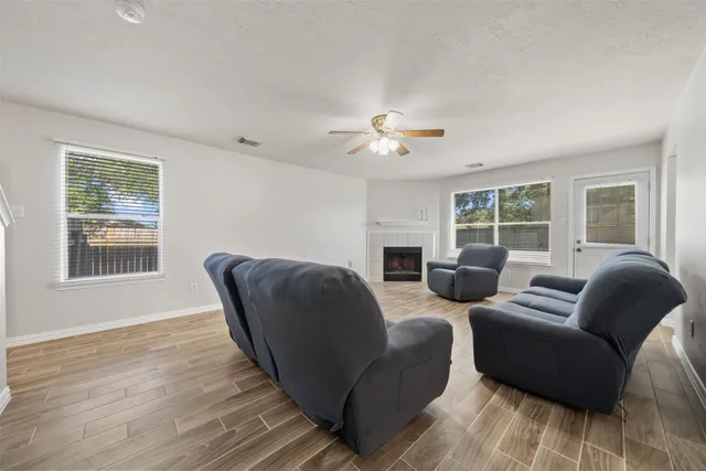 a living room with furniture and a window