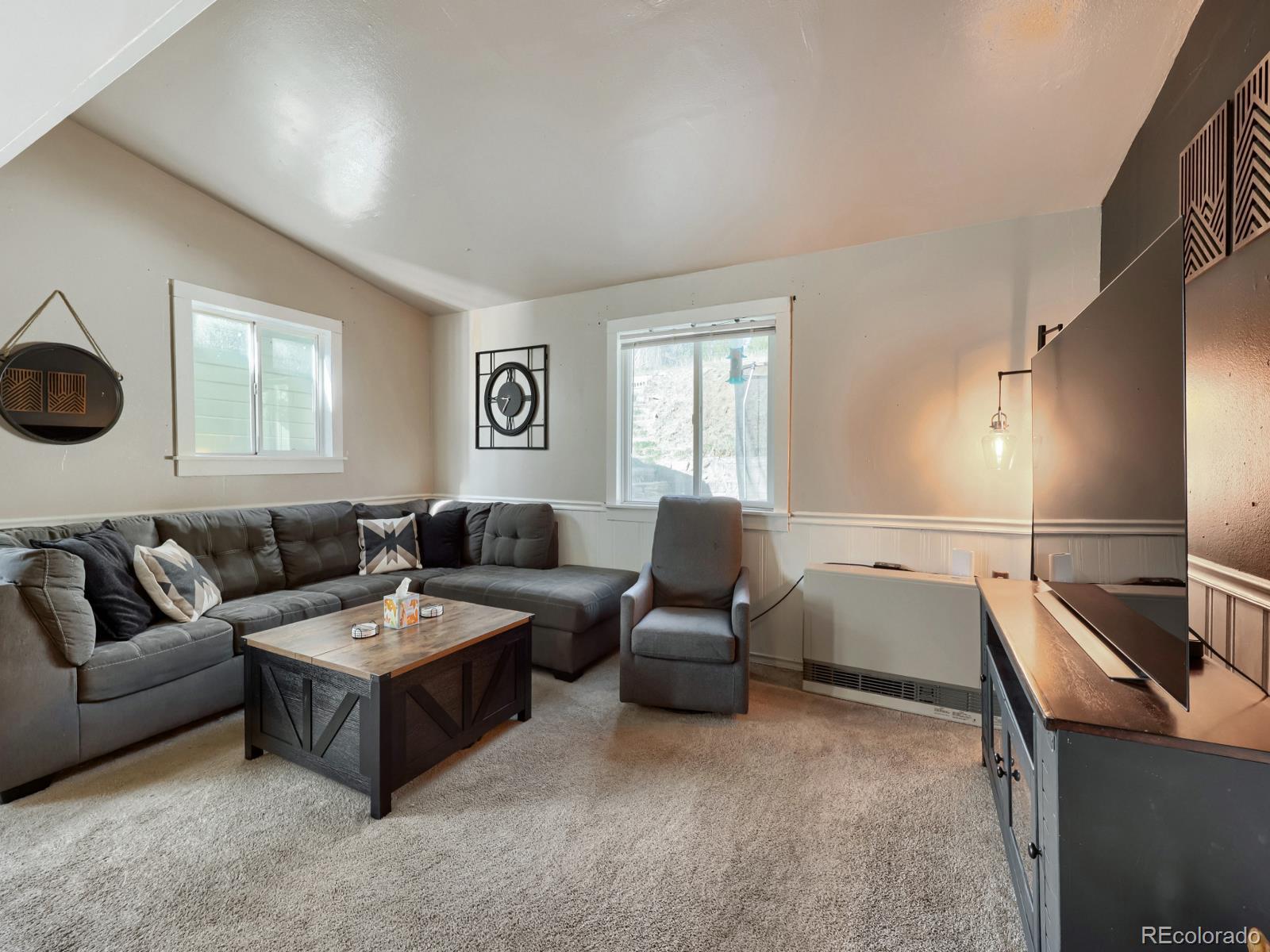24379 Main Street Elbert, CO 80106 - Photo 8 of 29 a living room with furniture and a window