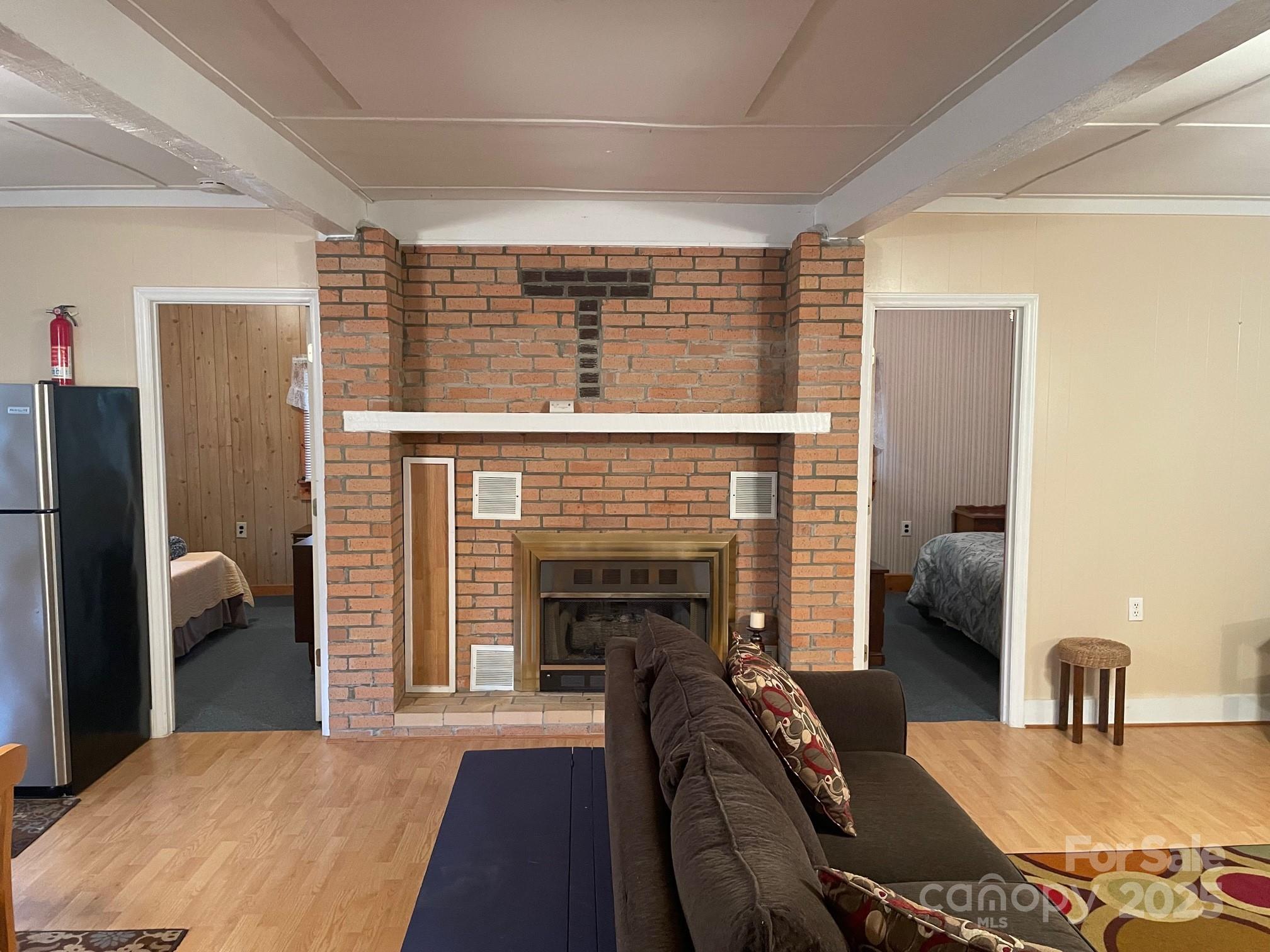 207 Rion Circle Winnsboro, SC 29180 - Photo 11 of 17 a bedroom with furniture and a fireplace