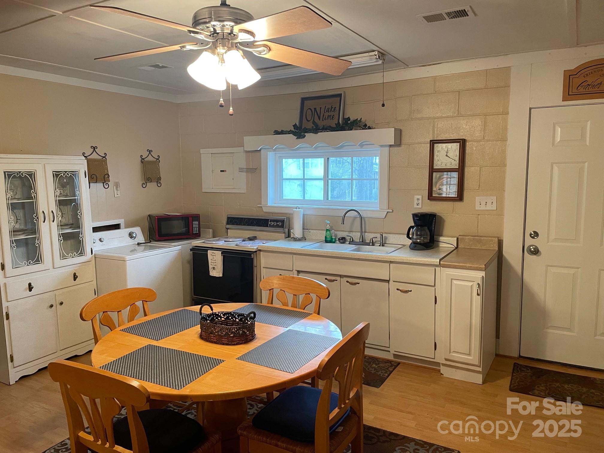 207 Rion Circle Winnsboro, SC 29180 - Photo 12 of 17 a view of a dining room with furniture and window