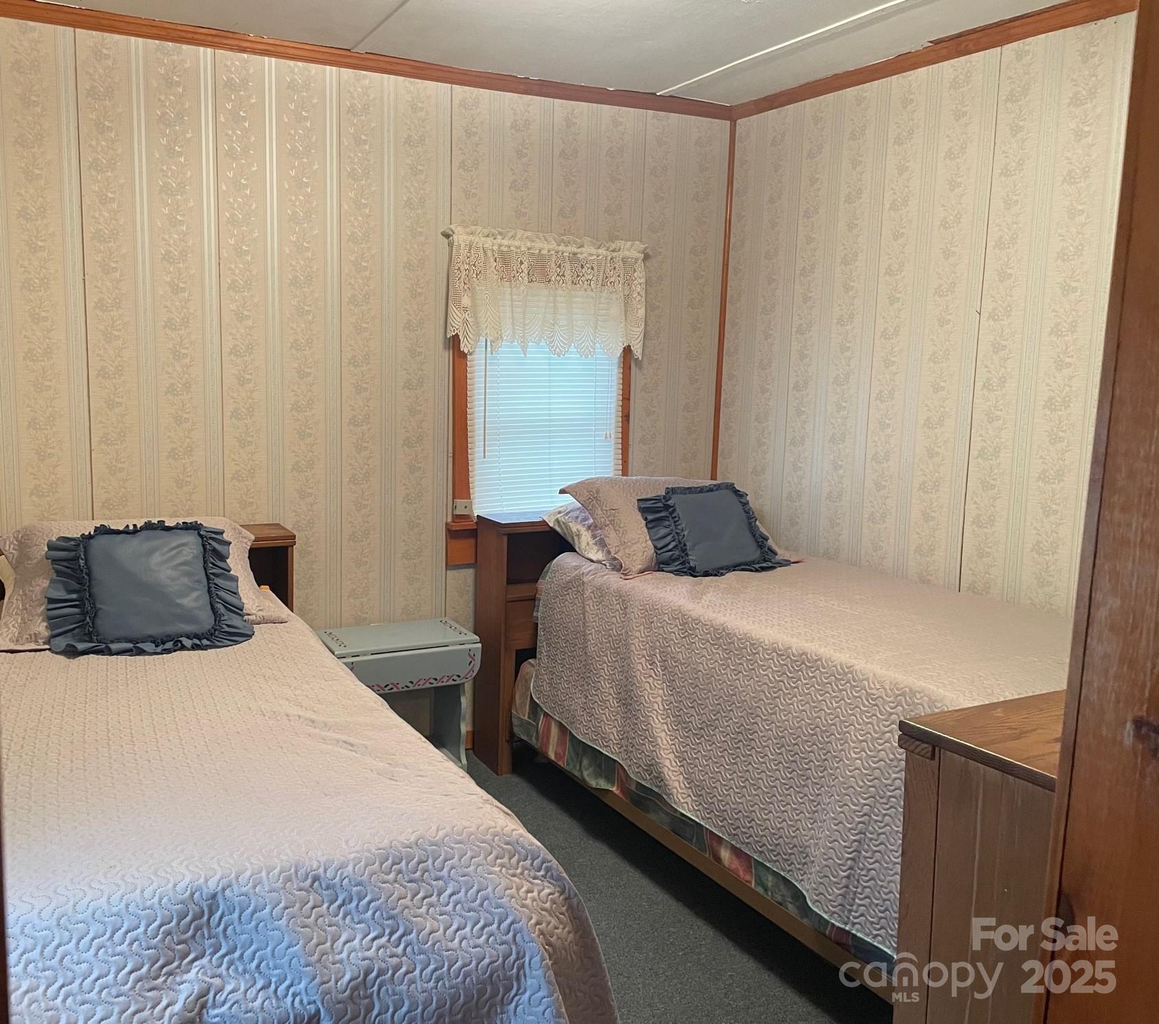 207 Rion Circle Winnsboro, SC 29180 - Photo 7 of 17 a bedroom with a bed and a mirror