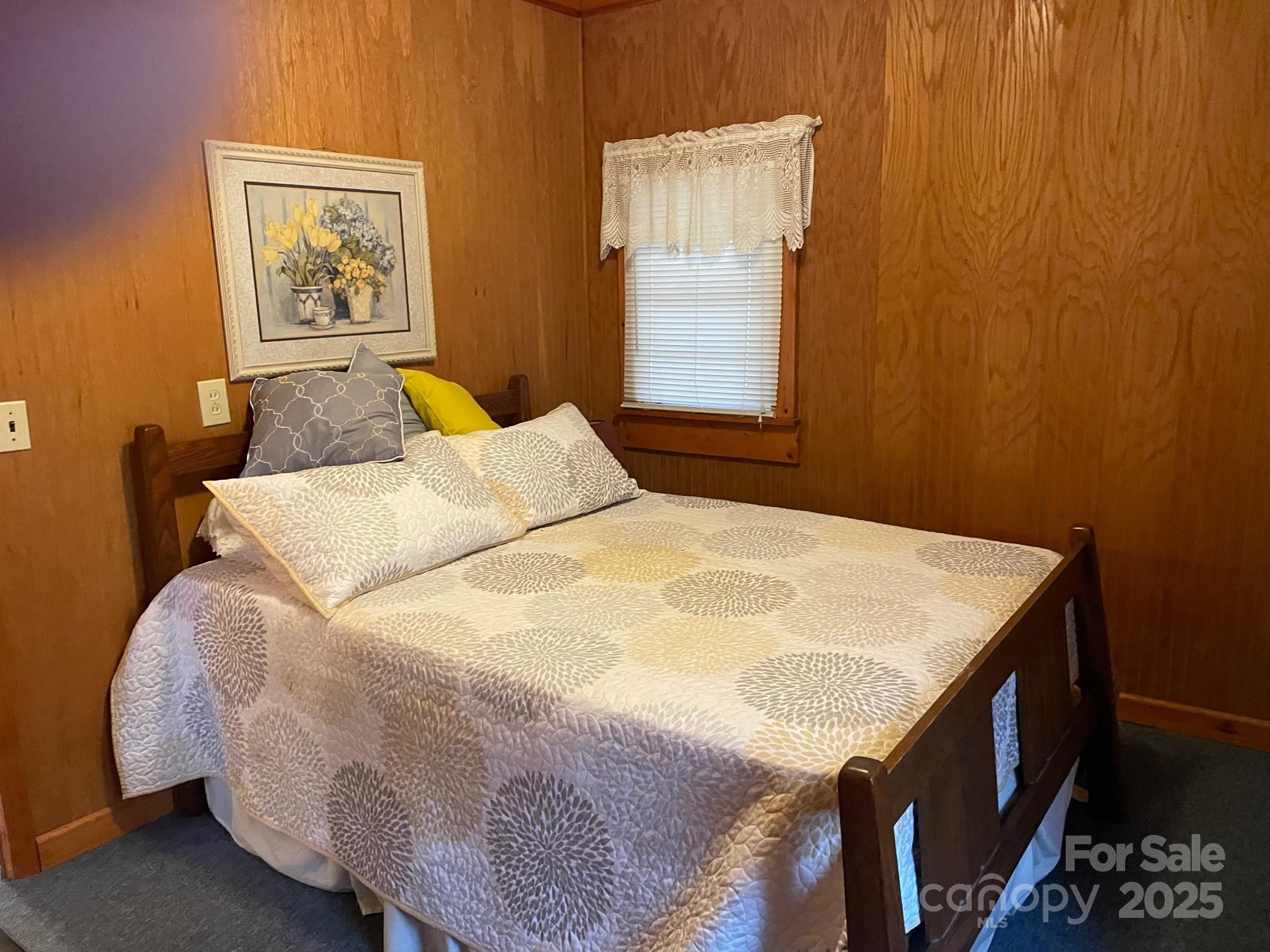 207 Rion Circle Winnsboro, SC 29180 - Photo 9 of 17 a bedroom with a bed and a window