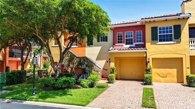 a front view of a house with yard