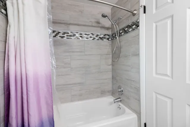 a bathroom with a bathtub