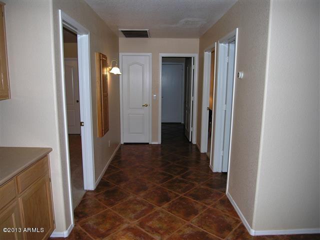 4669 South Rimrock Loop Gold Canyon, AZ 85118 - Photo 32 of 61 32 hall to secondary bedrooms