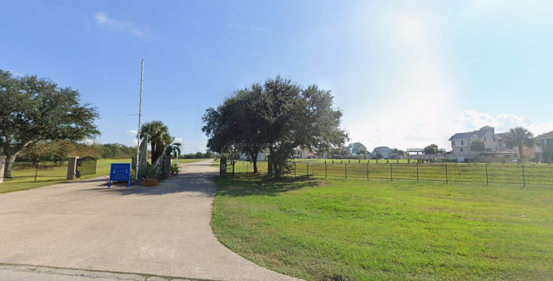 0 Southwind Port Arthur, TX 77640 - Photo 1 of 1 a view of a lake with a house in the background