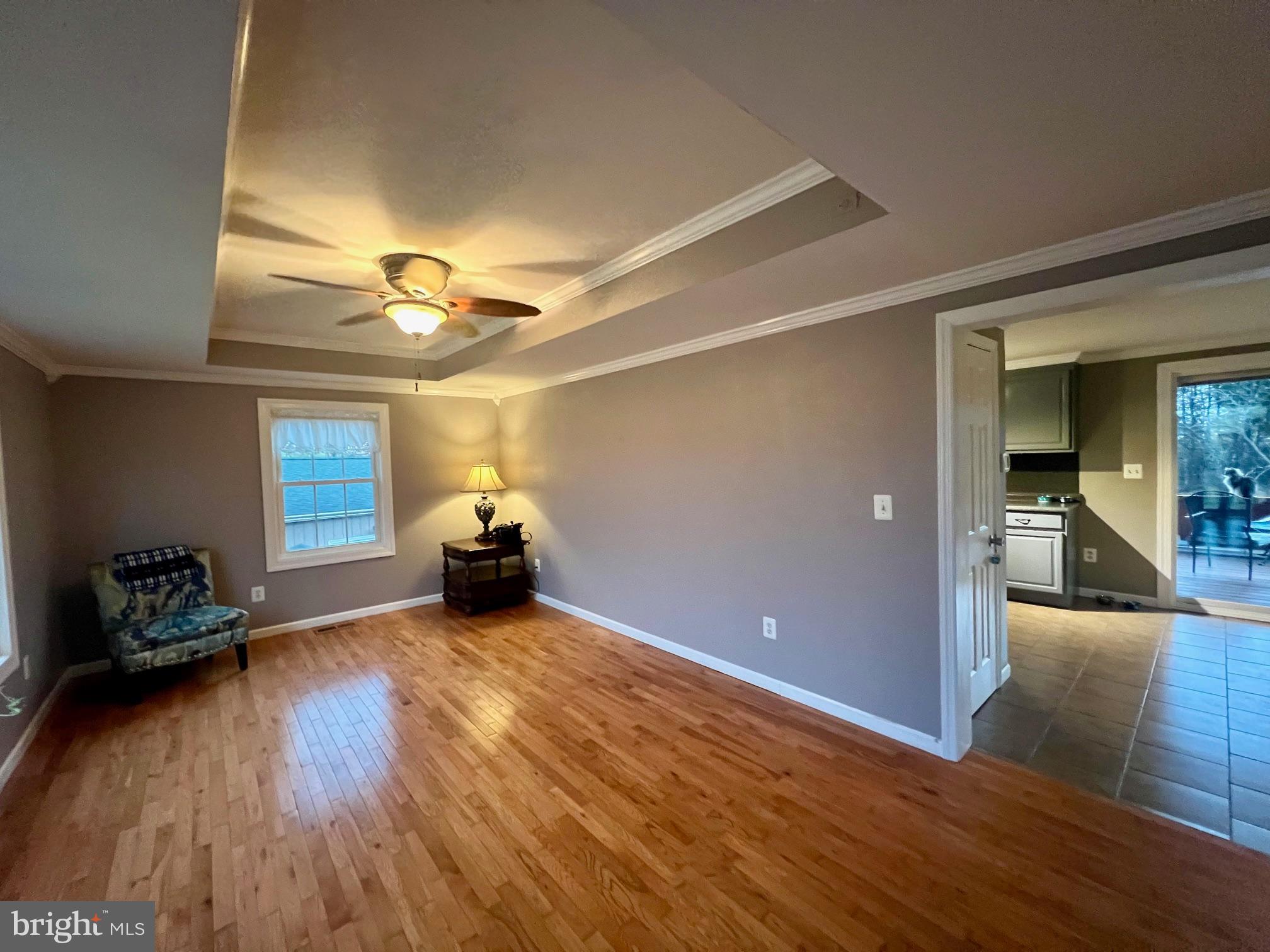 11731 Rocky Meadow Road Clear Spring, MD 21722 - Photo 6 of 41 Living room boasts tray ceiling and wood floor