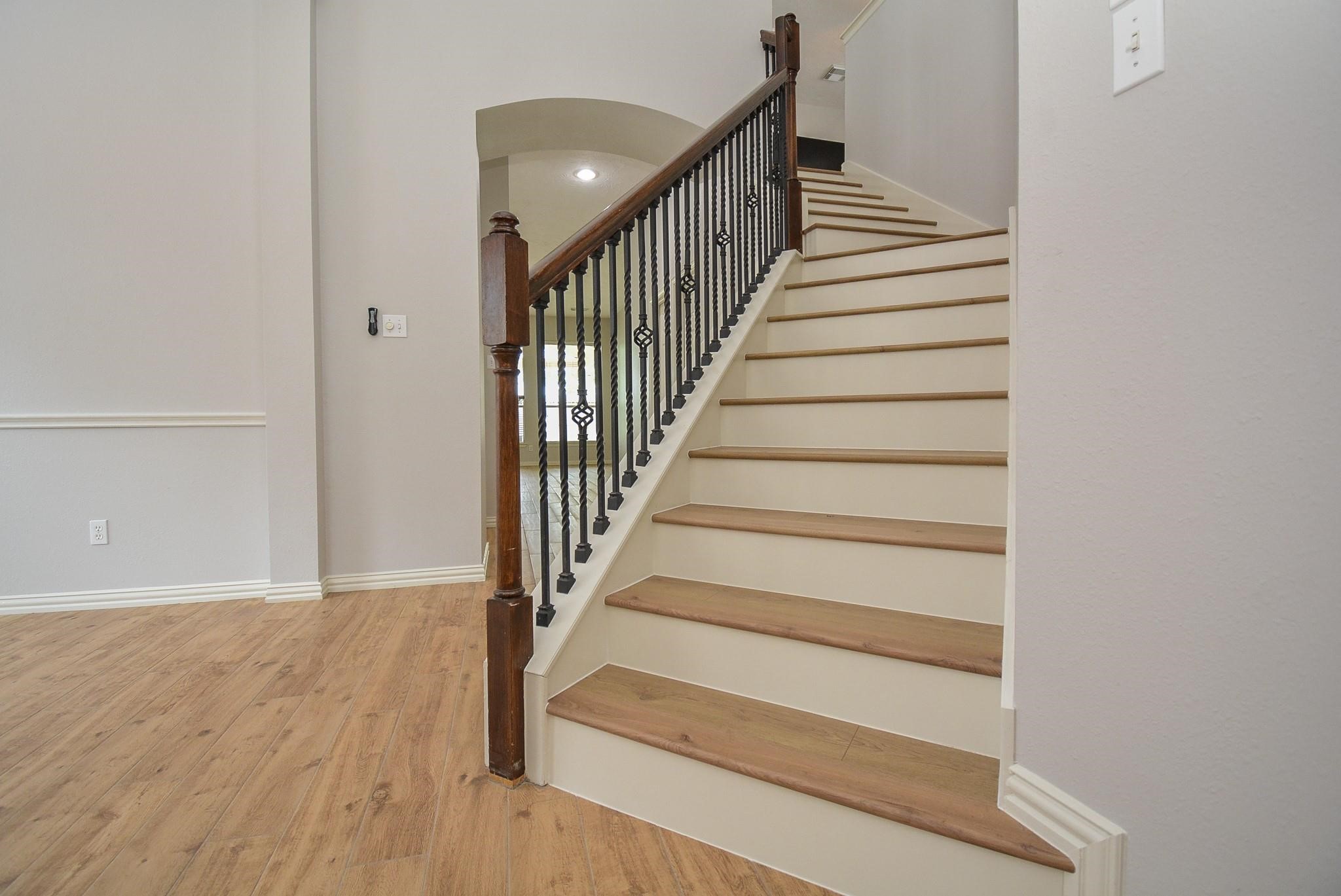 4007 Gazebo Lane Missouri City, TX 77459 - Photo 13 of 21 Staircase leads to Game Room with 2 Bedrooms & Full Bath upstairs.