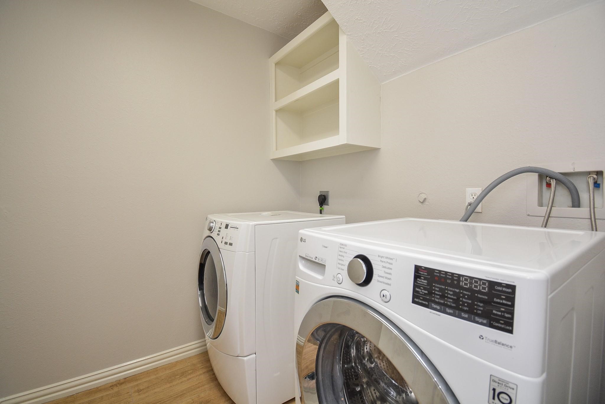 4007 Gazebo Lane Missouri City, TX 77459 - Photo 16 of 21 a utility room with dryer and washer