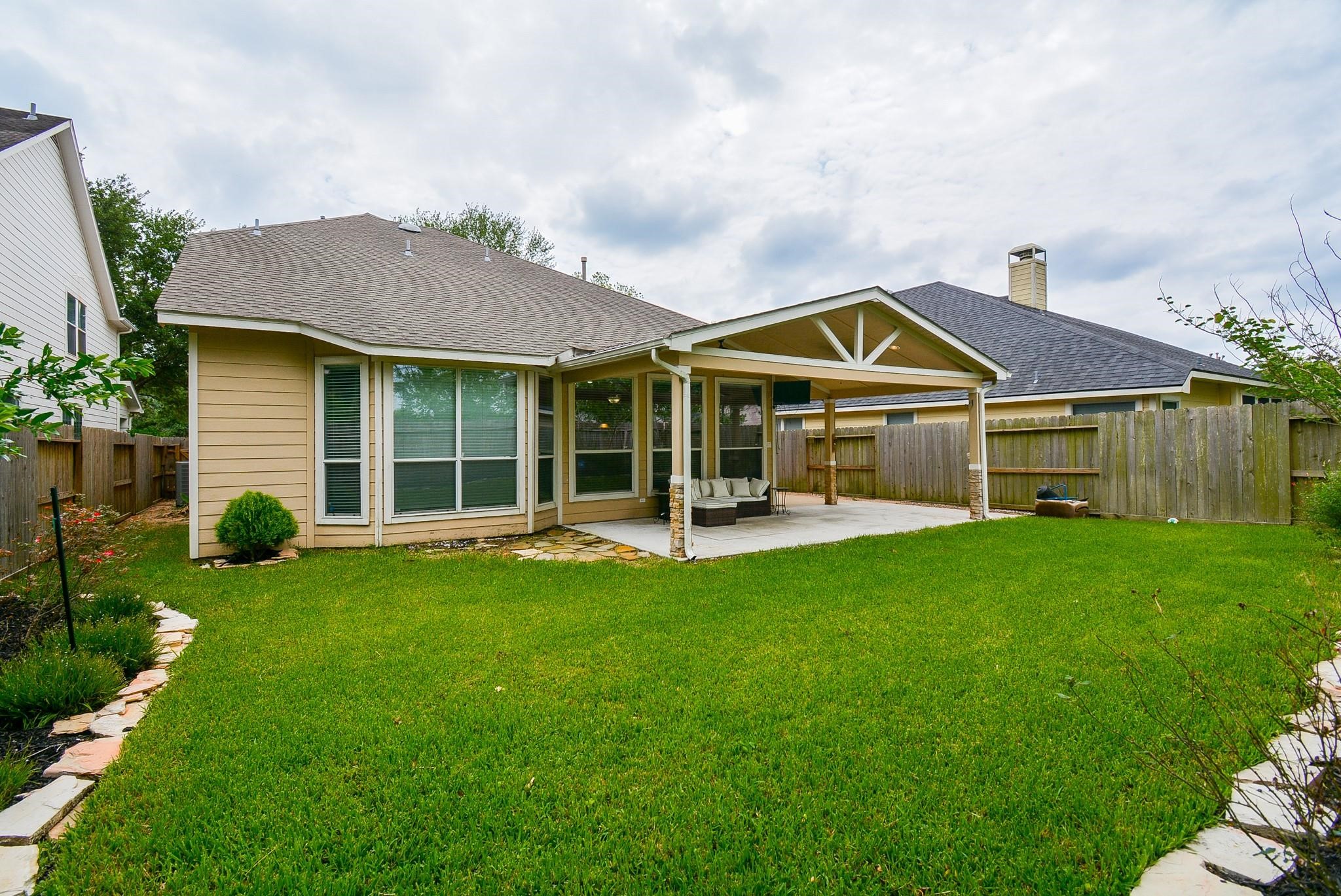 4007 Gazebo Lane Missouri City, TX 77459 - Photo 20 of 21 a view of a house with a yard and sitting area