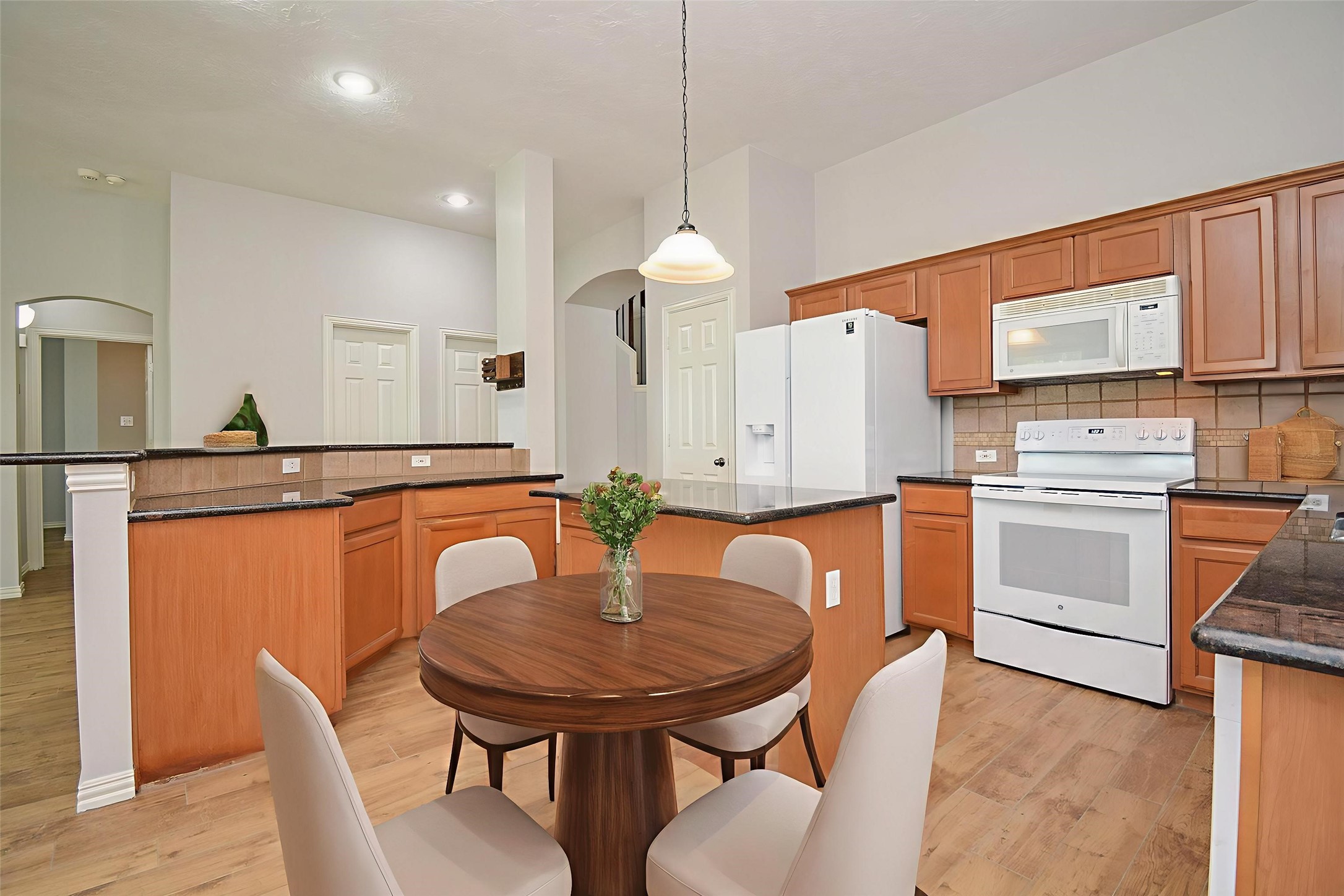 4007 Gazebo Lane Missouri City, TX 77459 - Photo 7 of 21 Kitchen with plenty of space for breakfast table (virtually staged).