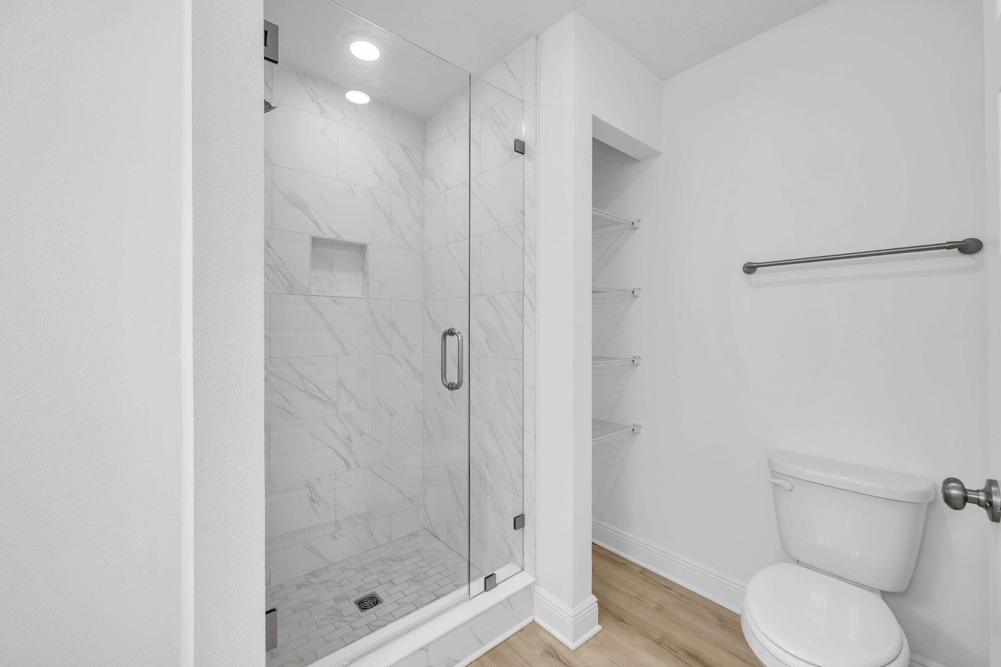 22 Redbird Loop Destin, FL 32541 - Photo 27 of 40 a bathroom with a shower a toilet and a sink