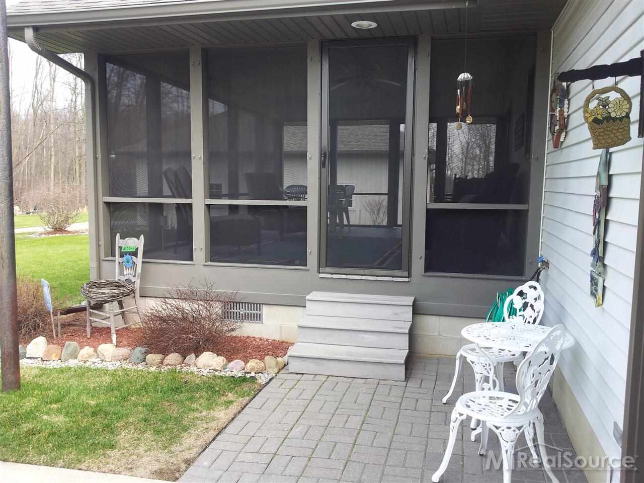 12576 Burt Road Emmett, MI 48022 - Photo 9 of 31 sun room entrance