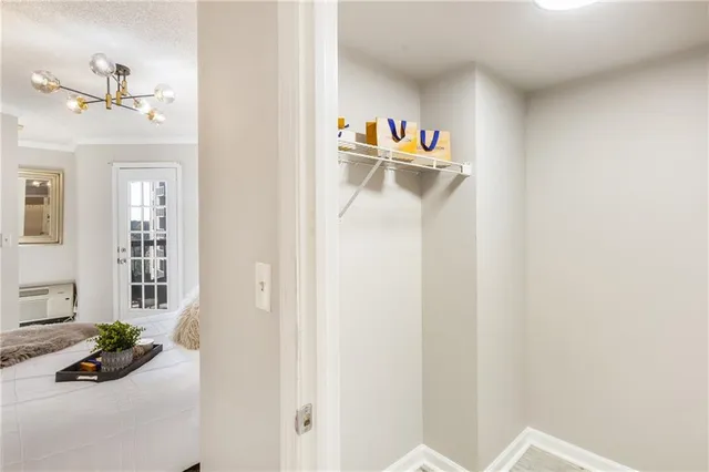 a bathroom with a granite countertop sink a toilet and a mirror