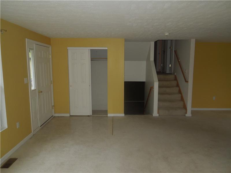 189 Profio Road McDonald, PA 15057 - Photo 11 of 25 1st Floor Plan. standing in livingroom --view of entrance, front door and steps to split level