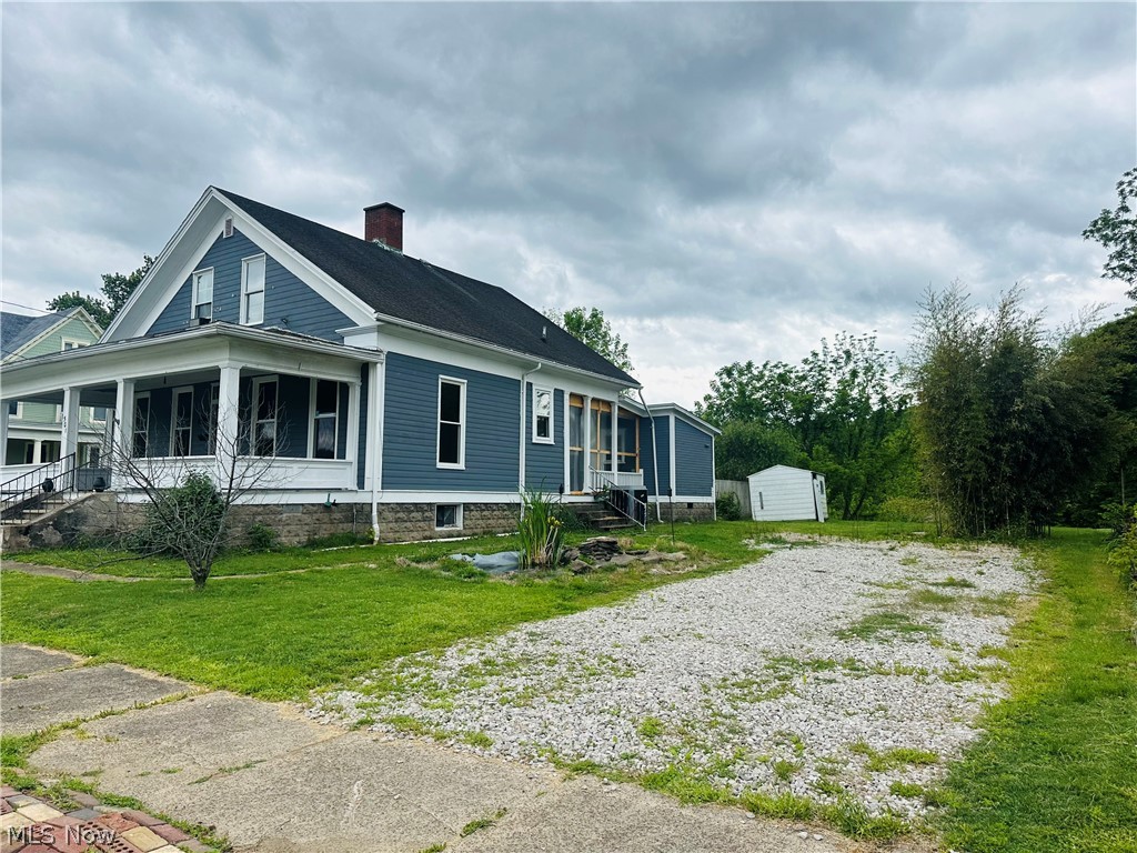 501 Riverside Drive St. Marys, WV 26170 - Photo 2 of 30 Side Yard with Off Street Parking