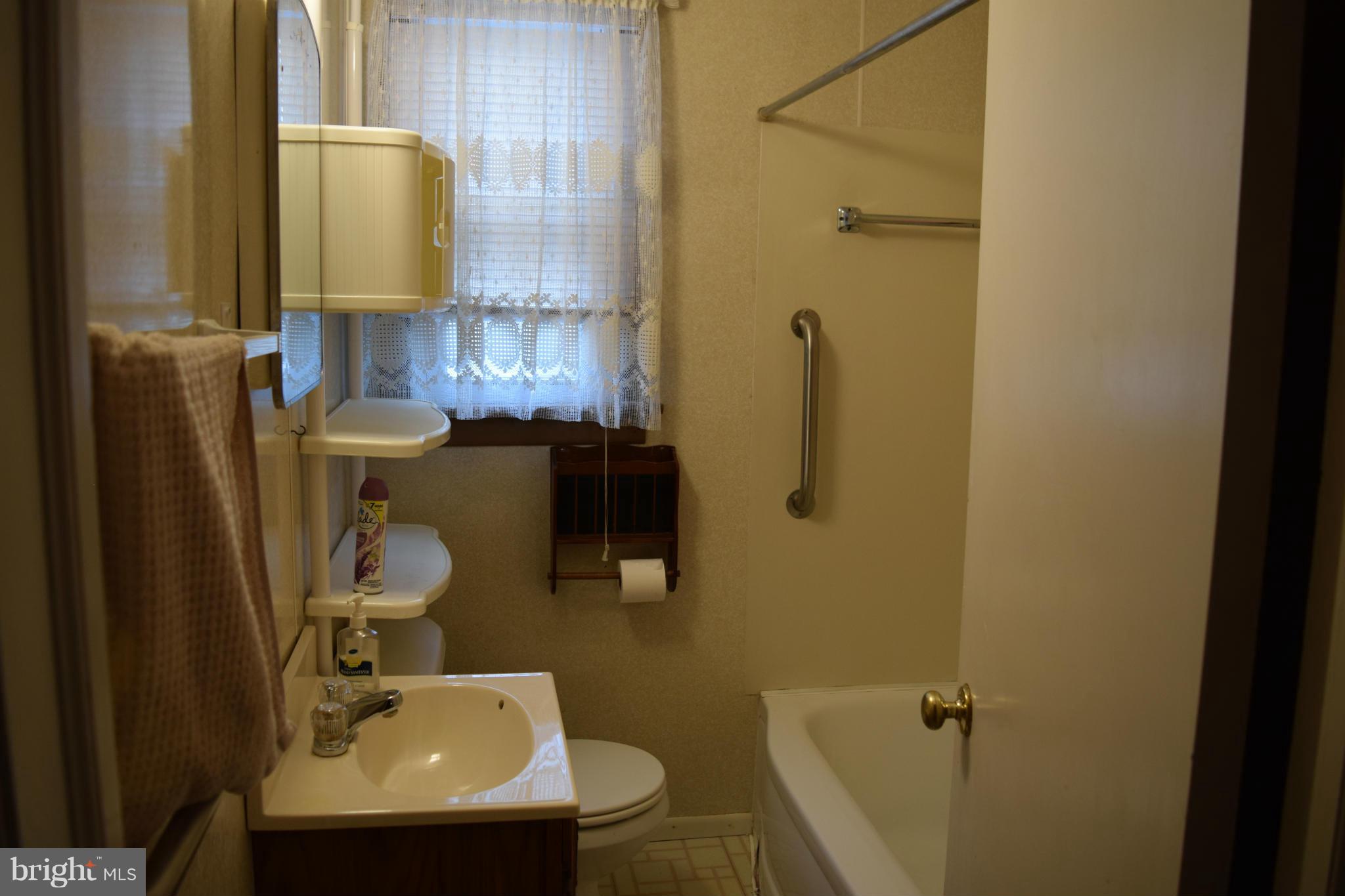 301 Nottingham Road Hagerstown, MD 21740 - Photo 8 of 11 a bathroom with a sink toilet and shower