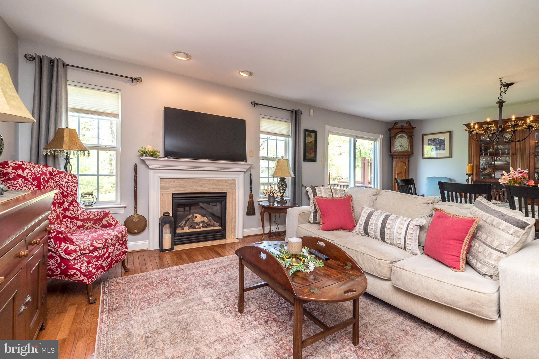 329 Manor Road Harleysville, PA 19438 - Photo 11 of 39 a living room with furniture fireplace and flat screen tv