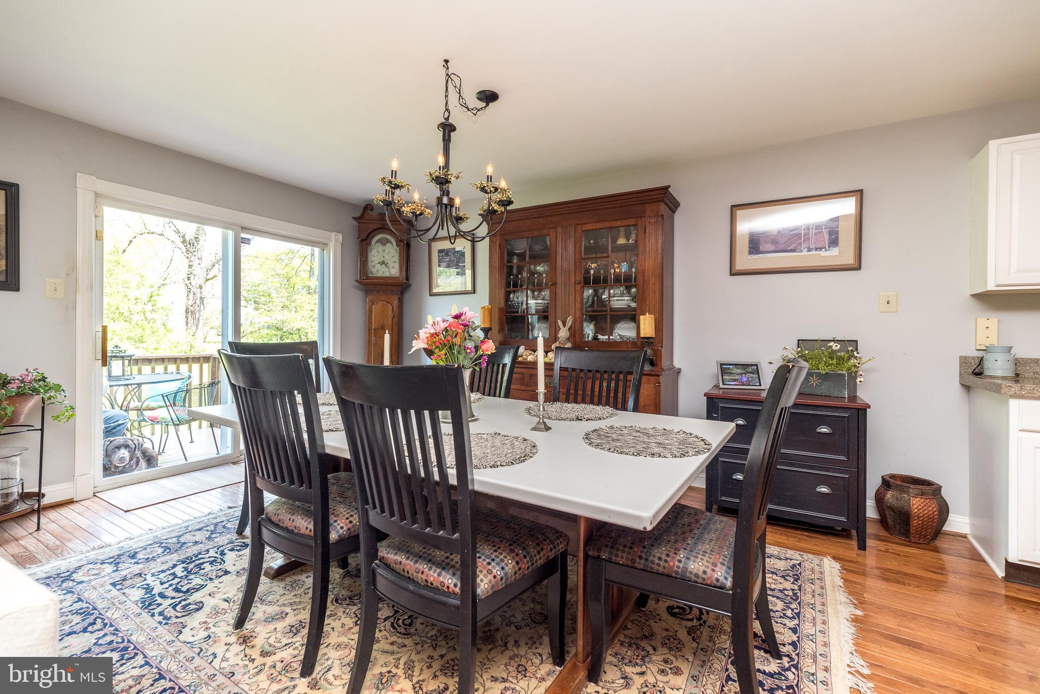 329 Manor Road Harleysville, PA 19438 - Photo 12 of 39 a view of a dining room with furniture window and wooden floor