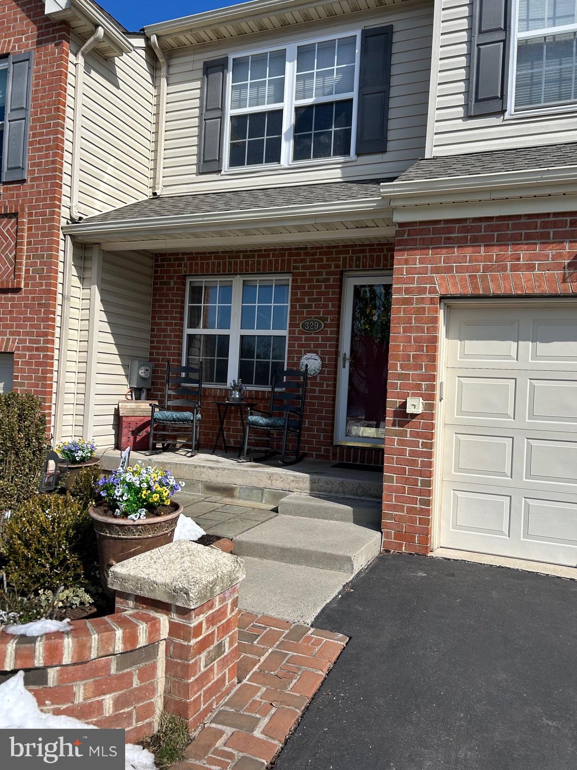 329 Manor Road Harleysville, PA 19438 - Photo 2 of 39 a front view of a house with a yard