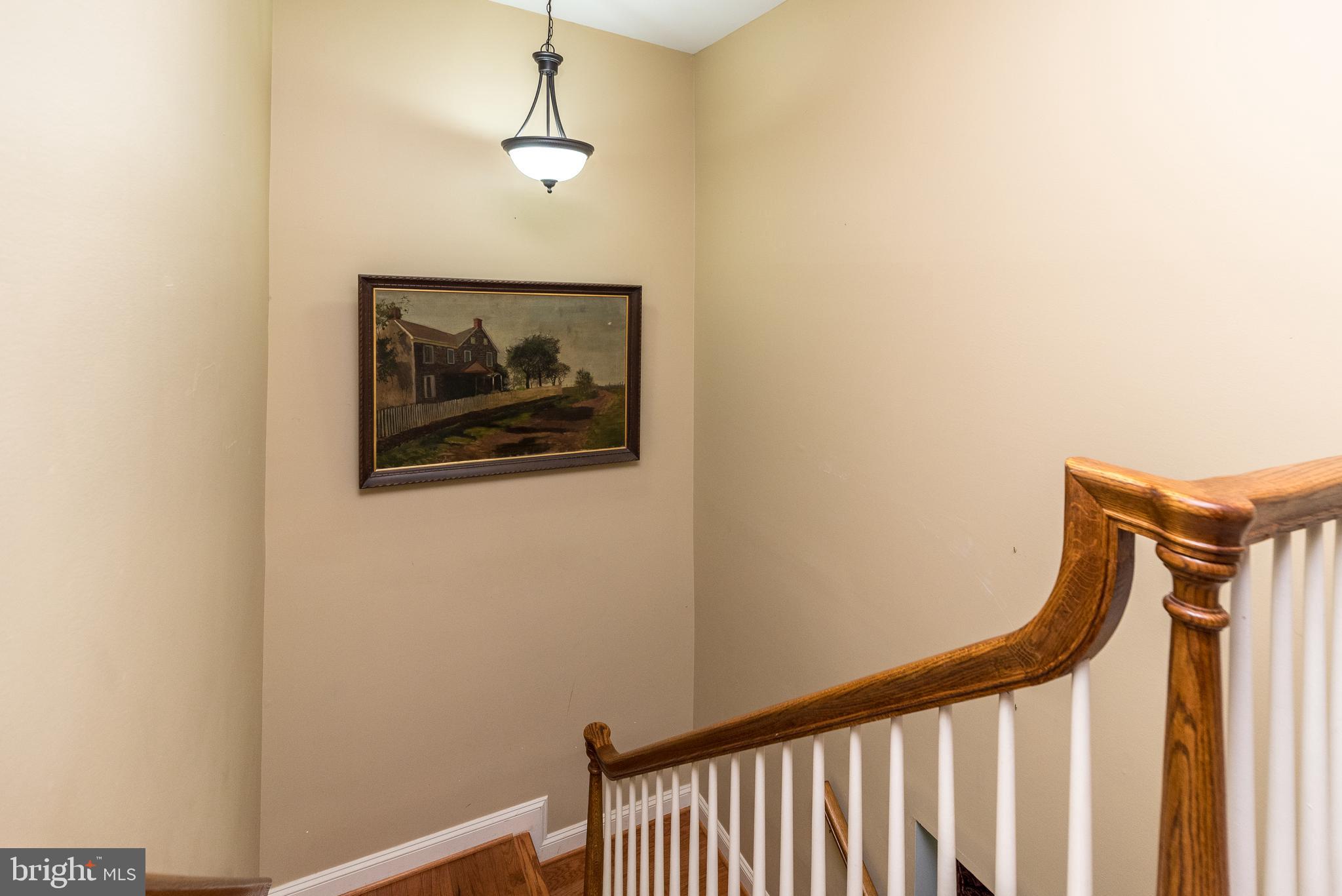 329 Manor Road Harleysville, PA 19438 - Photo 21 of 39 a view of a hallway with a small space