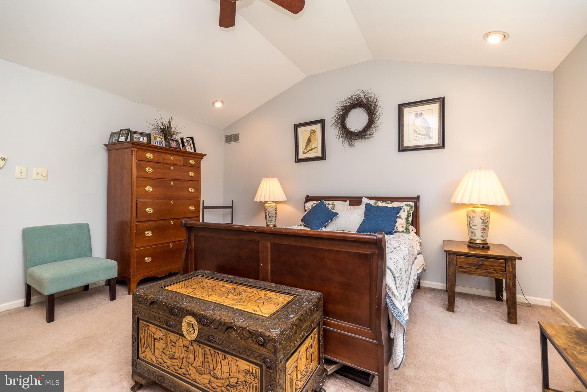 329 Manor Road Harleysville, PA 19438 - Photo 22 of 39 a living room with furniture and a chair