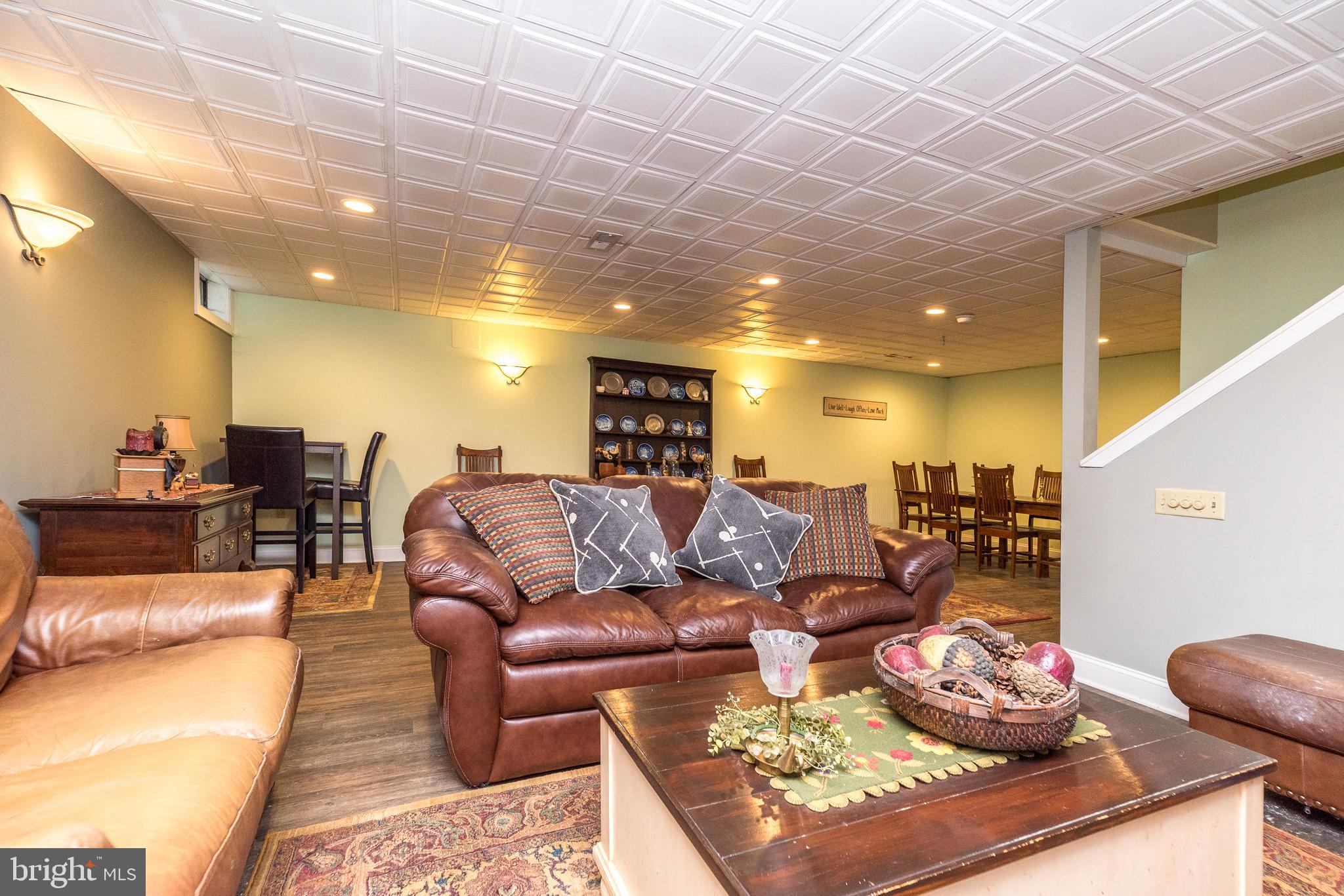 329 Manor Road Harleysville, PA 19438 - Photo 31 of 39 a living room with furniture and a wooden floor