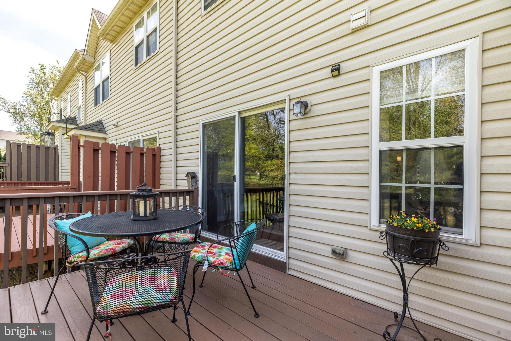 329 Manor Road Harleysville, PA 19438 - Photo 36 of 39 a view of a chairs and table in the patio