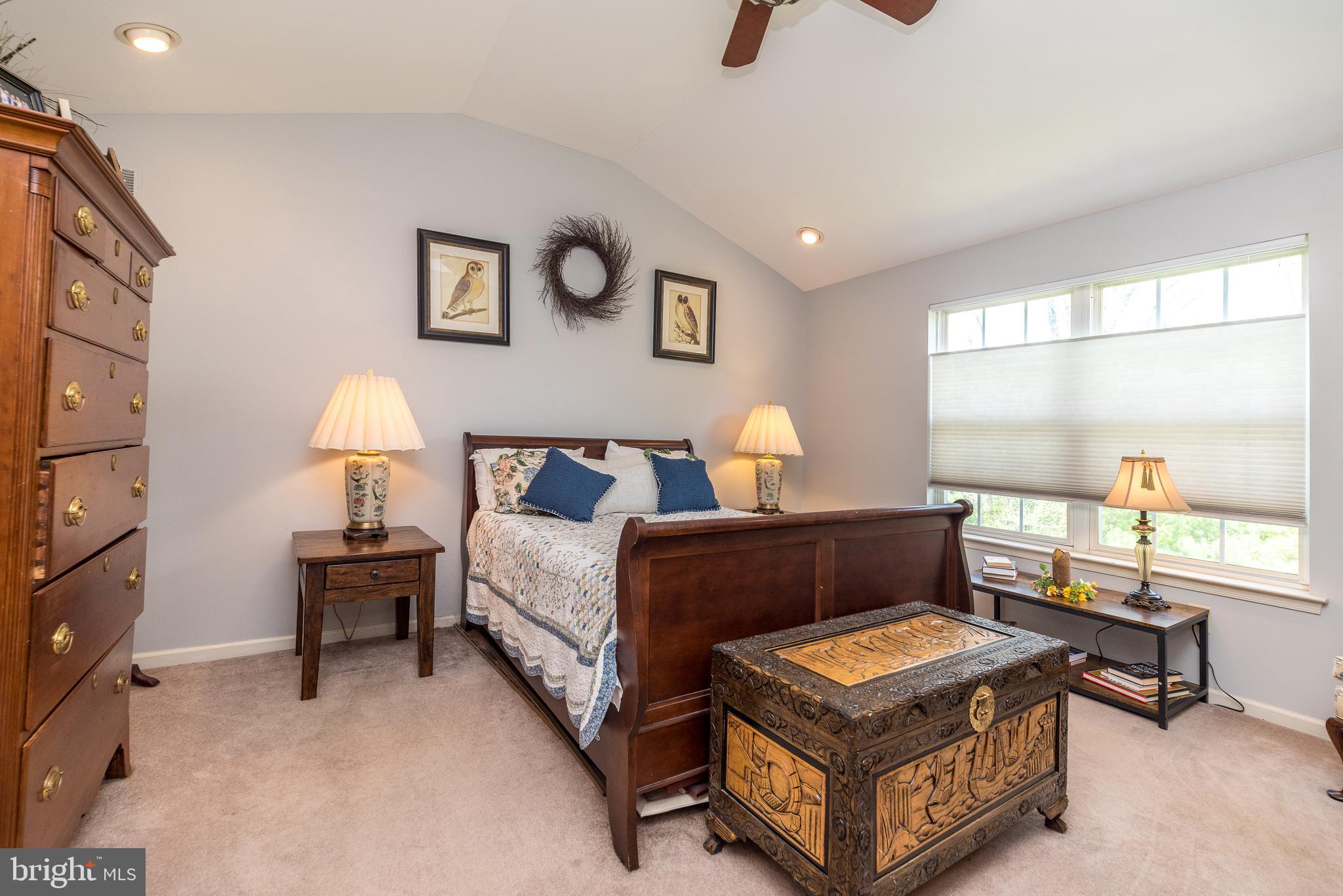 329 Manor Road Harleysville, PA 19438 - Photo 37 of 39 a bedroom with a bed and a window