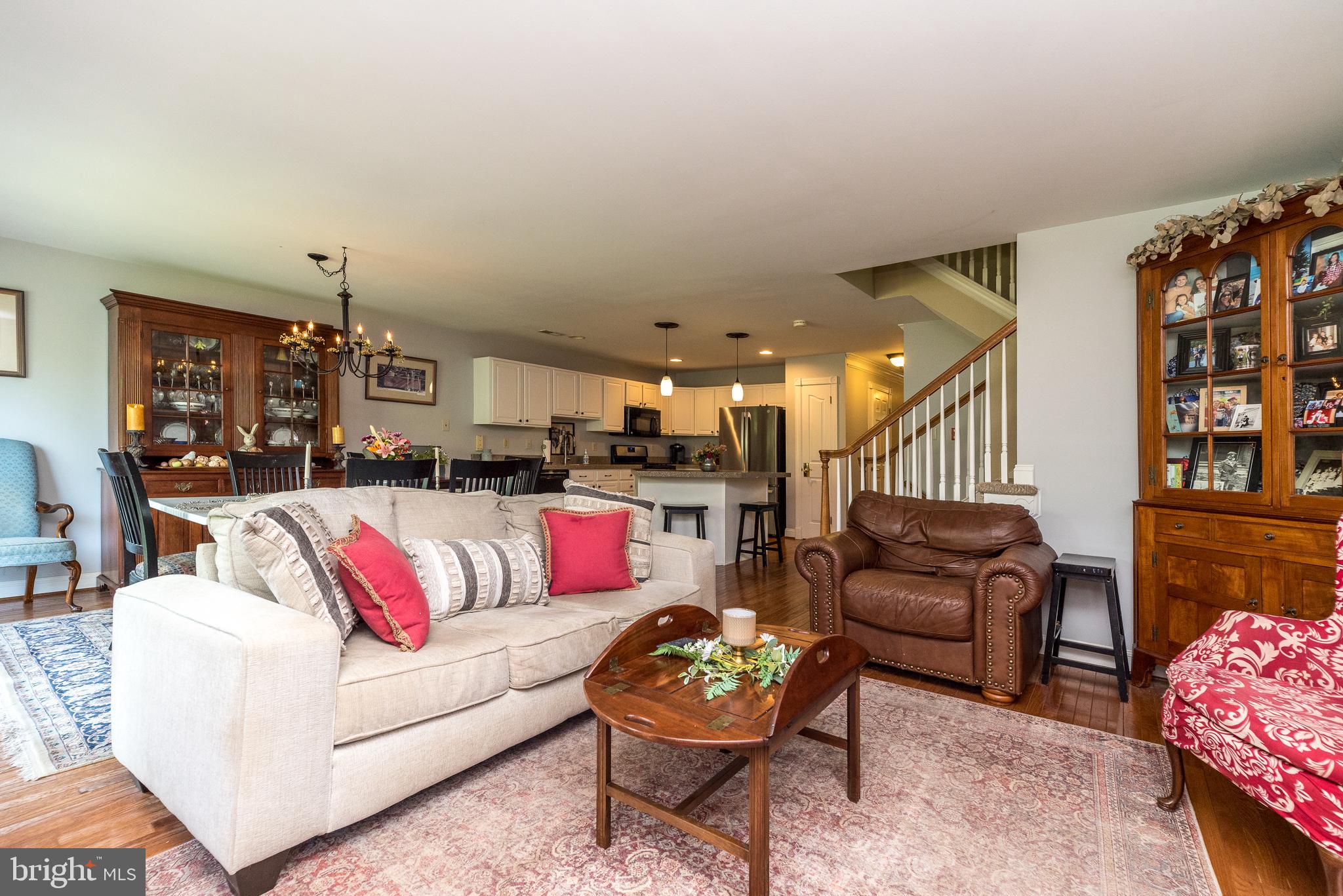 329 Manor Road Harleysville, PA 19438 - Photo 9 of 39 a living room with furniture and kitchen view