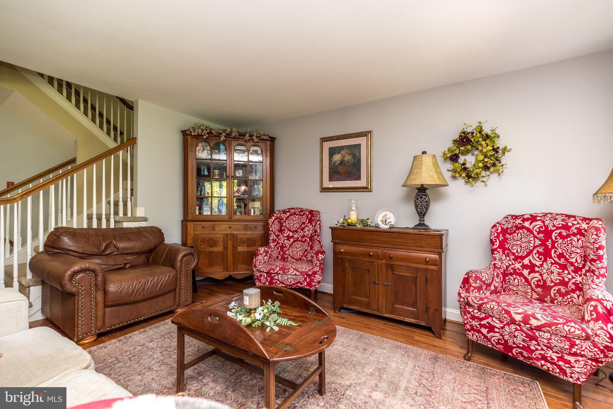 329 Manor Road Harleysville, PA 19438 - Photo 10 of 39 a living room with furniture a rug and a window