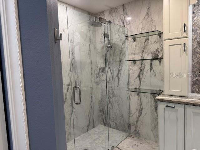 5511 Key W Place, Unit 5511 Bradenton, FL 34203 - Photo 20 of 38 a bathroom with a shower