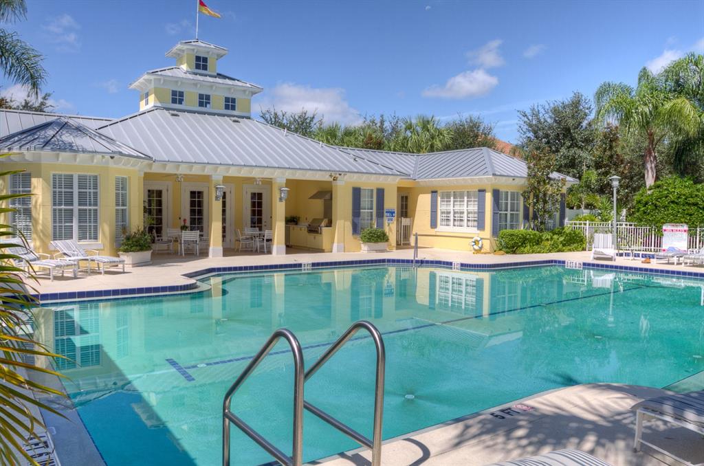 5511 Key W Place, Unit 5511 Bradenton, FL 34203 - Photo 25 of 38 front view of a house with a yard