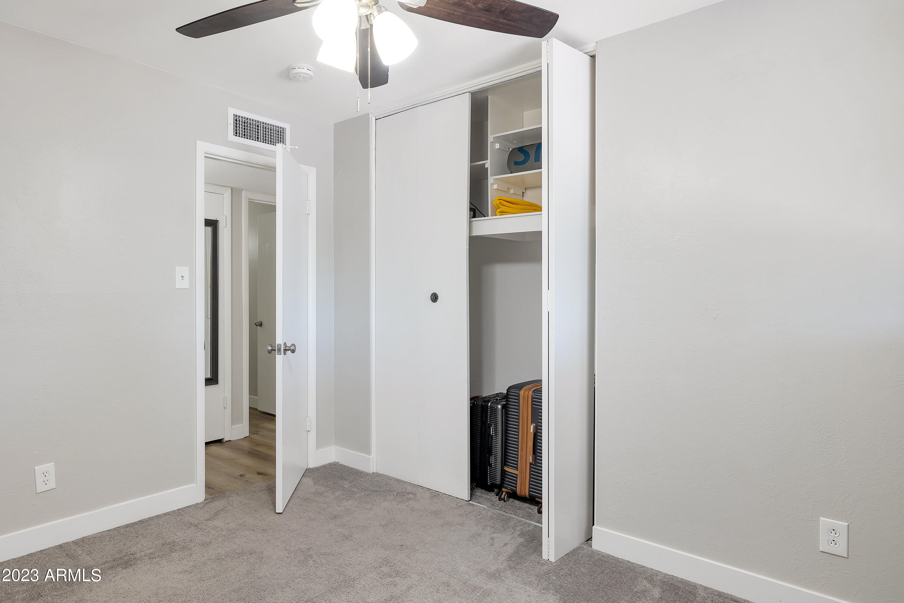 5473 West Osborn Road Phoenix, AZ 85031 - Photo 23 of 37 an empty room with closet area