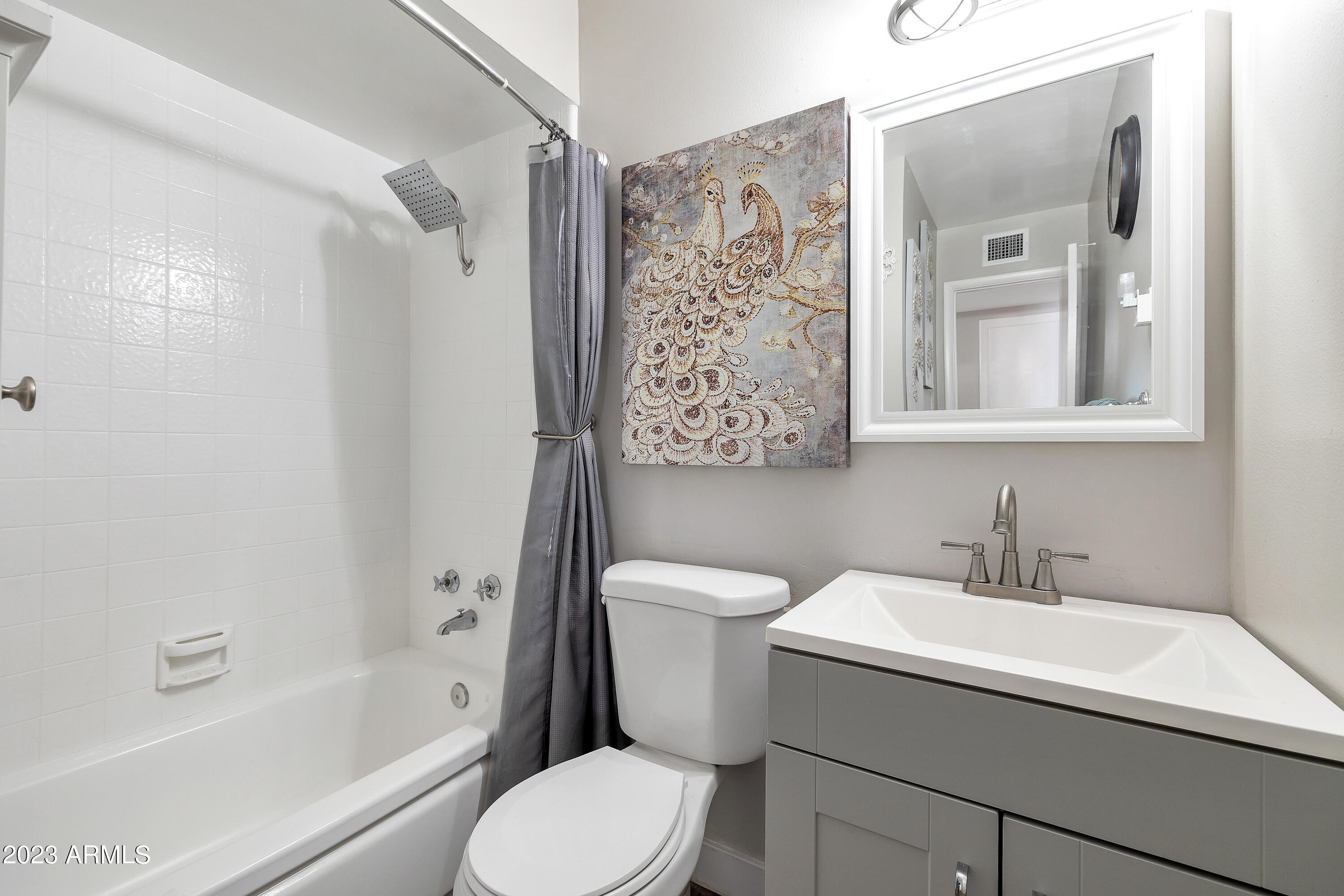 5473 West Osborn Road Phoenix, AZ 85031 - Photo 24 of 37 a bathroom with a sink toilet and shower