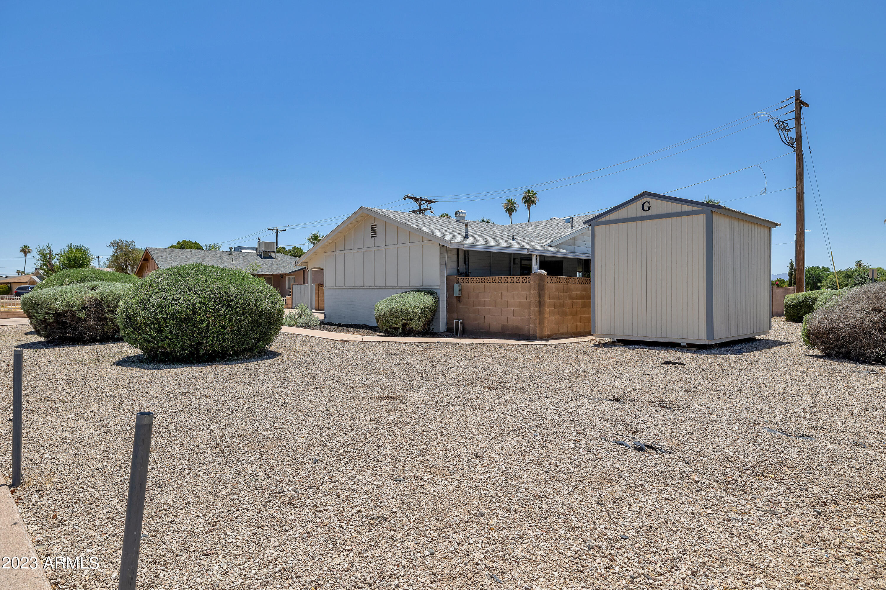 5473 West Osborn Road Phoenix, AZ 85031 - Photo 3 of 37 a view of a house with backyard and plants
