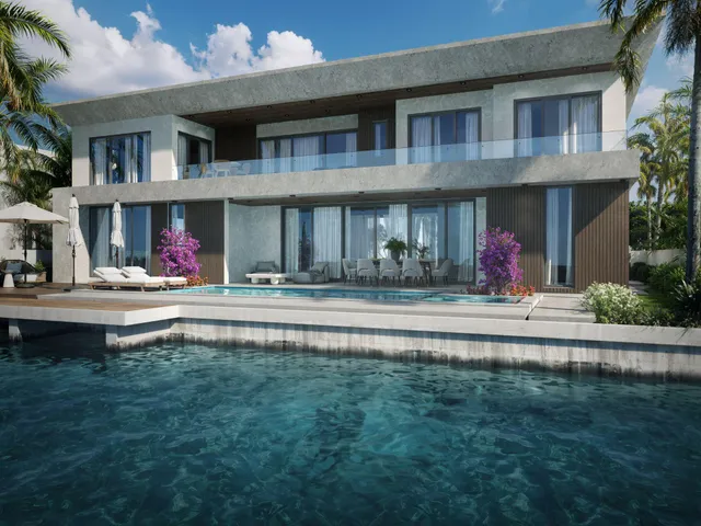 a front view of building with small yard