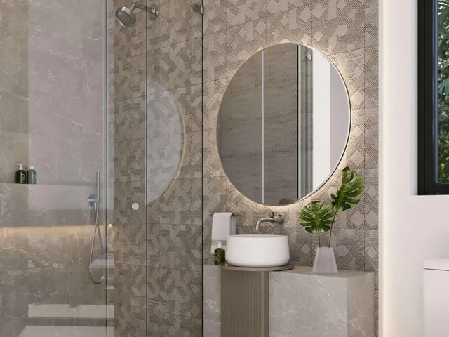 a bathroom with a shower and a mirror