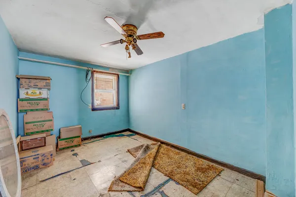 a view of a room with toys and wooden floor