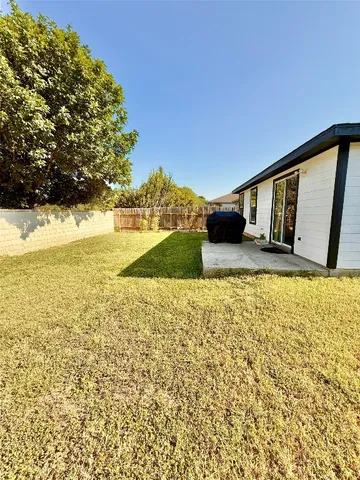 a view of an ocean with a mountain