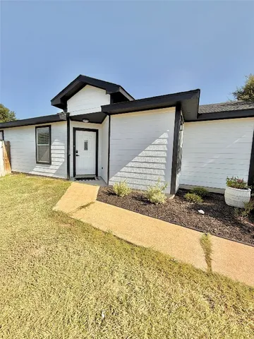 a house view with a outdoor space